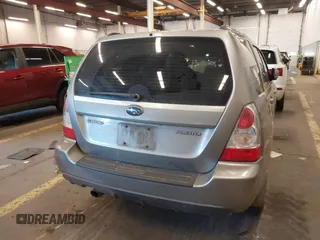2007 Subaru Forester X w/Premium Pkg with VIN JF1SG65657H719525, listed as a IAAI auction lot 41696437 with 217,895 mi miles. Bid and sale history available at carsss.com. Image 16.