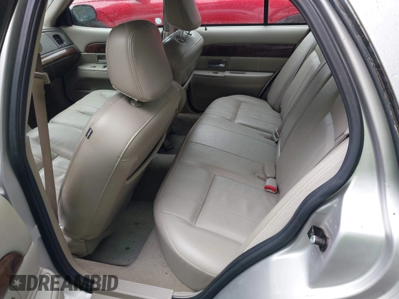 2010 Mercury Grand Marquis LS z VIN 2MEBM7FV5AX606629, wystawiony jako IAAI lot #42345444 z przebiegiem 66 600 mil mil oraz . Historia ofert i sprzedaży dostępna na DreamBid. Obrazek 8.