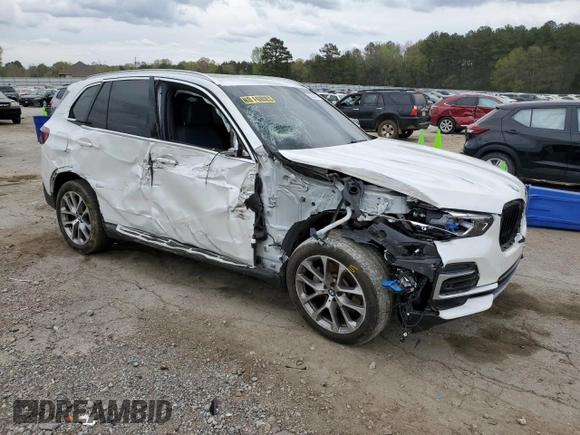 2022 BMW X5 xDrive40i with VIN 5UXCR6C01N9M26766, listed as a Copart auction lot 50990865 with 24,036 mi miles and Salvage Title. Bid and sale history available at DreamBid. Image 4.