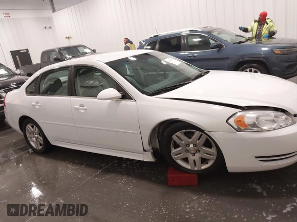 2014 Chevrolet Impala LT with VIN 2G1WB5E30E1140591, listed as a IAAI auction lot 41620447 with 186,226 mi miles and . Bid and sale history available at DreamBid. Image 13.