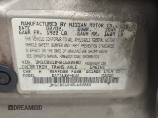 2002 Nissan Sentra GXE z VIN 3N1CB51D42L652280, wystawiony jako IAAI lot #41983766 z przebiegiem 184 787 mil mil oraz . Historia ofert i sprzedaży dostępna na DreamBid. Obrazek 9.