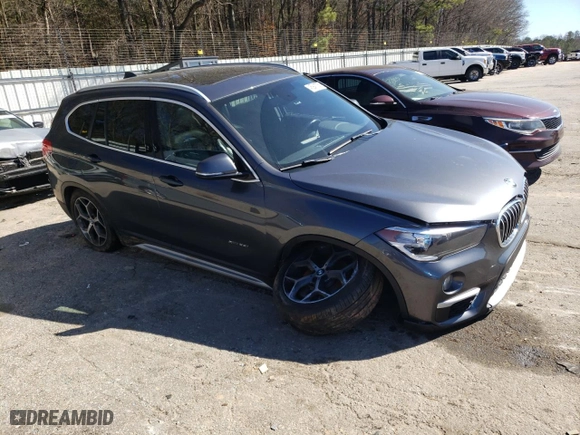 2018 BMW X1 xDrive28i with VIN WBXHT3C31J5K27206, listed as a Copart auction lot 45941755 with 99,777 mi miles and Salvage Title. Bid and sale history available at carsss.com. Image 4.
