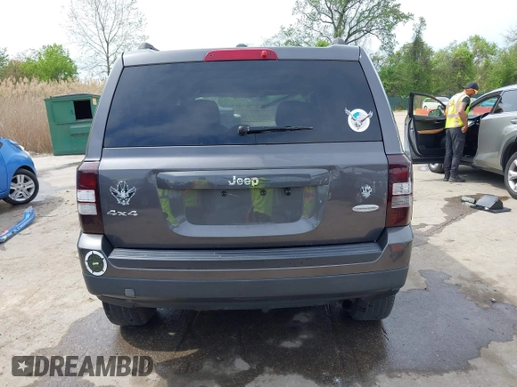2014 Jeep Patriot Latitude with VIN 1C4NJRFB3ED847997, listed as a IAAI auction lot 42109140 with 121,299 mi miles and . Bid and sale history available at carsss.com. Image 16.