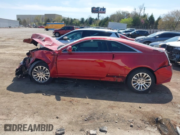 2014 Cadillac CTS Premium with VIN 1G6DD1E31E0120172, listed as a IAAI auction lot 41919738 with 104,744 mi miles and . Bid and sale history available at DreamBid. Image 14.