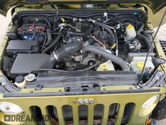 2008 Jeep Wrangler Rubicon z VIN 1J8GA69138L533859, wystawiony jako Copart lot #54202865 z przebiegiem 75 742 mil mil oraz Szkoda całkowita • Salvage title. Historia ofert i sprzedaży dostępna na DreamBid. Obrazek 12.