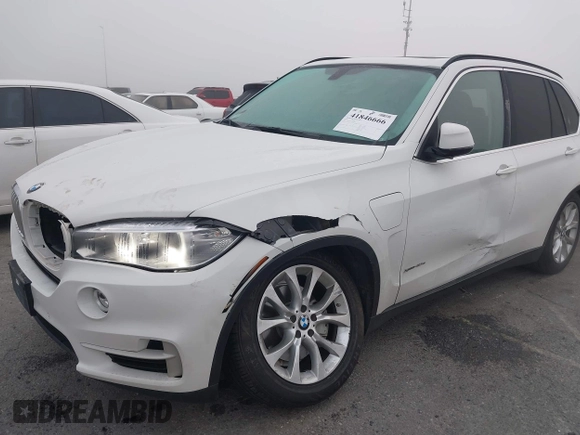 2016 BMW X5 xDrive40e with VIN 5UXKT0C59G0S79593, listed as a IAAI auction lot 41846666 with 57,178 mi miles and . Bid and sale history available at DreamBid. Image 6.