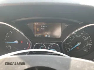2016 Ford Focus SE z VIN 1FADP3F23GL288232, wystawiony jako Copart lot #62565095 z przebiegiem 11 634 mil mil oraz Szkoda całkowita • Salvage title. Historia ofert i sprzedaży dostępna na DreamBid. Obrazek 9.