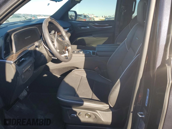 2023 Cadillac Escalade z VIN 1GYS3KKL8PR532308, wystawiony jako Copart lot #81524234 z przebiegiem 11 968 mil mil oraz Szkoda całkowita • Salvage title. Historia ofert i sprzedaży dostępna na DreamBid. Obrazek 7.
