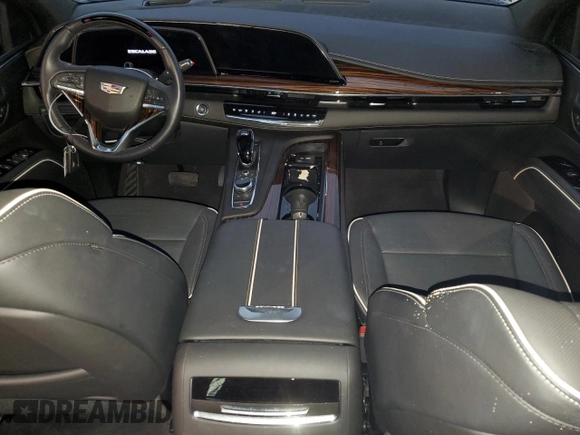 2023 Cadillac Escalade z VIN 1GYS3KKL3PR360009, wystawiony jako Copart lot #77258524 z przebiegiem 12 874 mil mil oraz Szkoda całkowita • Salvage title. Historia ofert i sprzedaży dostępna na DreamBid. Obrazek 8.