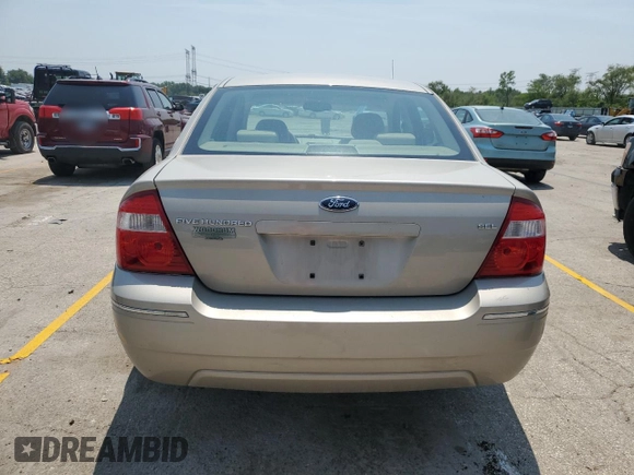 2005 Ford Five Hundred SEL with VIN 1FAFP24165G104114, listed as a Copart auction lot 60530235 with Not provided miles and Salvage title. Bid and sale history available at DreamBid. Image 6.