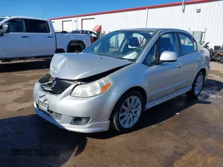 2009 Suzuki SX4 Man Sport FWD with VIN JS2YC414596200374, listed as a IAAI auction lot 41429760 with 134,611 mi miles. Bid and sale history available at carsss.com. Image 2.