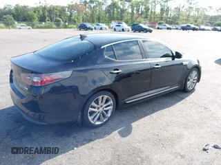 2015 Kia Optima EX with VIN KNAGN4AD7F5090393, listed as a IAAI auction lot 42632332 with 205,227 mi miles and . Bid and sale history available at DreamBid. Image 4.