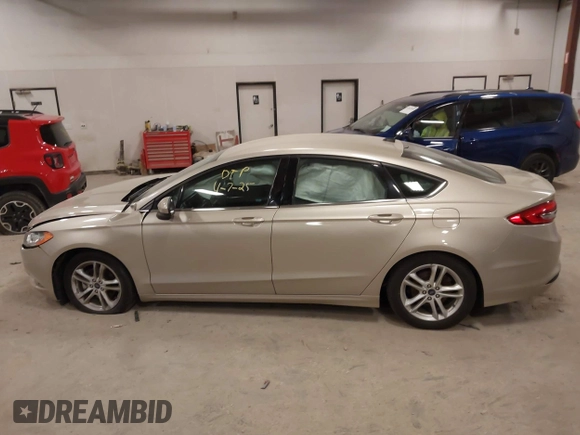 2018 Ford Fusion SE z VIN 3FA6P0HD2JR201693, wystawiony jako IAAI lot #42012709 z przebiegiem 110 857 mil mil oraz . Historia ofert i sprzedaży dostępna na DreamBid. Obrazek 14.