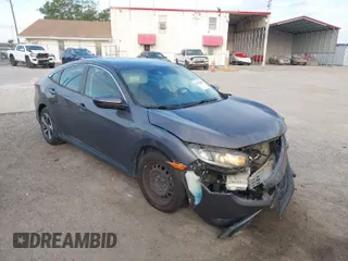 2019 Honda Civic Sedan LX with VIN 19XFC2F60KE018100, listed as a IAAI auction lot 41908486 with 124,357 mi miles. Bid and sale history available at carsss.com. Image 1.