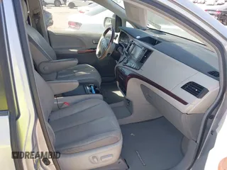 2012 Toyota Sienna XLE AAS with VIN 5TDYK3DC7CS185555, listed as a IAAI auction lot 42013098 with 140,969 mi miles. Bid and sale history available at carsss.com. Image 5.