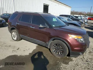 2012 Ford Explorer XLT with VIN 1FMHK8D86CGA27514, listed as a Copart auction lot 80331004 with 164,445 mi miles and Salvage title. Bid and sale history available at DreamBid. Image 4.