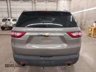 2018 Chevrolet Traverse LT z VIN 1GNEVHKW0JJ166321, wystawiony jako IAAI lot #42014168 z przebiegiem 81 442 mil mil oraz . Historia ofert i sprzedaży dostępna na DreamBid. Obrazek 17.