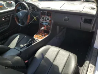 2001 Mercedes-Benz SLK-Class with VIN WDBKK65F81F210099, listed as a Copart auction lot 52606105 with 129,849 mi miles and Salvage Title. Bid and sale history available at carsss.com. Image 8.