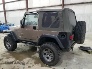 2003 Jeep Wrangler Rubicon z VIN 1J4FA69S13P345591, wystawiony jako Copart lot #41741685 z przebiegiem 85 335 mil mil oraz Szkoda całkowita • Salvage title. Historia ofert i sprzedaży dostępna na DreamBid. Obrazek 2.
