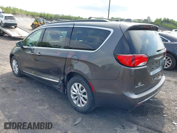 2017 Chrysler Pacifica Touring L with VIN 2C4RC1BG5HR705277, listed as a IAAI auction lot 42230036 with 75,287 mi miles and . Bid and sale history available at DreamBid. Image 3.