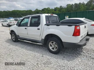 2005 Ford Explorer Sport Trac XLS with VIN 1FMZU67K85UA59170, listed as a Copart auction lot 54472775 with 227,225 mi miles and Salvage title. Bid and sale history available at DreamBid. Image 2.
