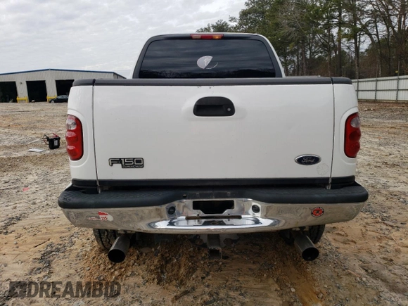 2002 Ford F-150 XLT with VIN 1FTRW08682KC80529, listed as a Copart auction lot 37546994 with 159,980 mi miles and Salvage Title. Bid and sale history available at carsss.com. Image 6.