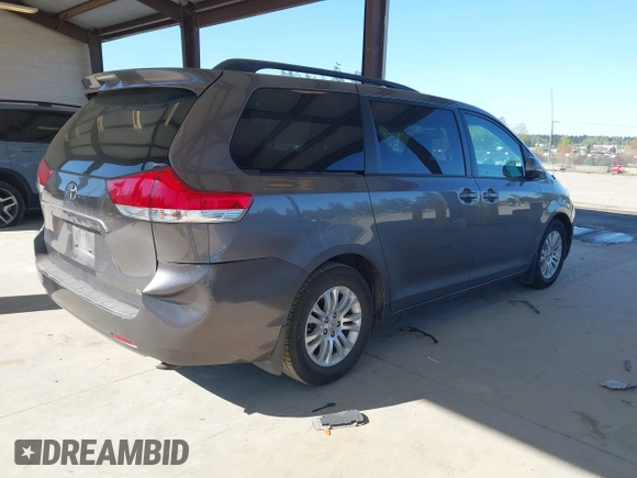 2011 Toyota Sienna XLE AAS with VIN 5TDYK3DC7BS047822, listed as a IAAI auction lot 42073635 with 150,424 mi miles. Bid and sale history available at carsss.com. Image 4.