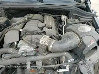 2018 Jeep Grand Cherokee SRT z VIN 1C4RJFDJ4JC144290, wystawiony jako Copart lot #59344945 z przebiegiem 61 809 mil mil oraz Szkoda całkowita • Salvage title. Historia ofert i sprzedaży dostępna na DreamBid. Obrazek 16.