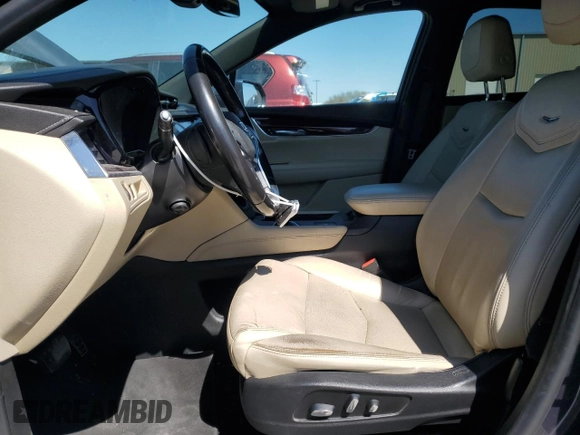 2019 Cadillac XT5 Luxury FWD with VIN 1GYKNCRS1KZ131818, listed as a Copart auction lot 49354595 with 131,995 mi miles and Salvage Title. Bid and sale history available at DreamBid. Image 7.