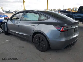 2025 Tesla Model 3 Long Range with VIN 5YJ3E1EBXSF912475, listed as a IAAI auction lot 41449488 with 3,100 mi miles. Bid and sale history available at carsss.com. Image 3.