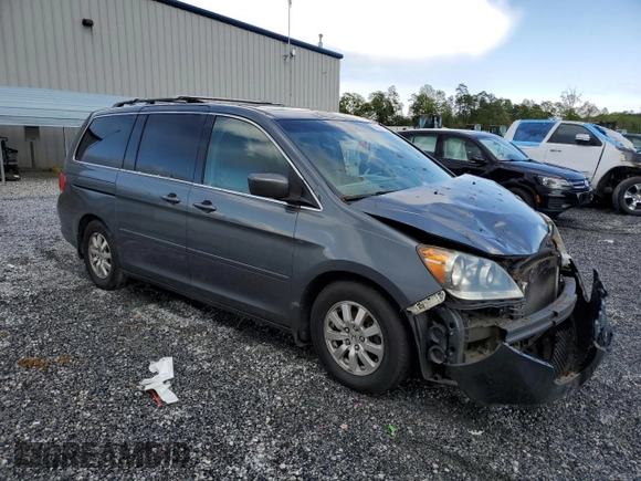 2010 Honda Odyssey EX-L with VIN 5FNRL3H73AB099787, listed as a Copart auction lot 52482325 with 235,785 mi miles and Salvage Title. Bid and sale history available at DreamBid. Image 4.