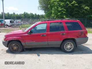 2001 Jeep Grand Cherokee Laredo z VIN 1J4GW48S11C720055, wystawiony jako IAAI lot #42453532 z przebiegiem 158 486 mil mil oraz . Historia ofert i sprzedaży dostępna na DreamBid. Obrazek 12.