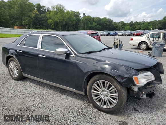 2012 Chrysler 300 C with VIN 2C3CCAKTXCH151465, listed as a Copart auction lot 65820264 with 132,609 mi miles and Salvage Title. Bid and sale history available at DreamBid. Image 4.