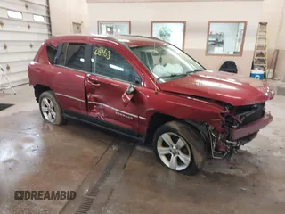 2014 Jeep Compass Latitude with VIN 1C4NJCEB2ED502667, listed as a IAAI auction lot 41628463 with 129,790 mi miles. Bid and sale history available at carsss.com. Image 1.