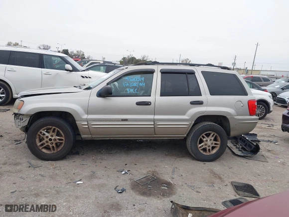 2004 Jeep Grand Cherokee Laredo with VIN 1J4GX48S44C301120, listed as a IAAI auction lot 41281556 with 267,246 mi miles. Bid and sale history available at carsss.com. Image 15.