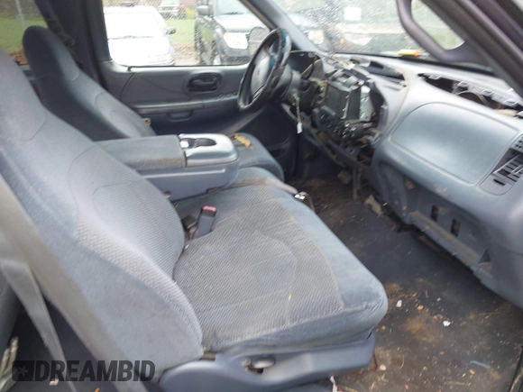 1999 Ford F-150 with VIN 1FTRX17W5XNA06036, listed as a IAAI auction lot 41897561 with 222,979 mi miles and . Bid and sale history available at DreamBid. Image 5.