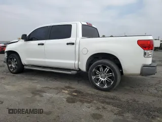 2011 Toyota Tundra with VIN 5TFEM5F19BX023519, listed as a Copart auction lot 58642205 with 157,480 mi miles and Salvage title. Bid and sale history available at DreamBid. Image 2.