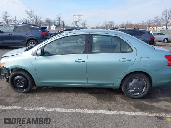 2009 Toyota Yaris with VIN JTDBT903794060474, listed as a IAAI auction lot 42005903 with 104,607 mi miles. Bid and sale history available at carsss.com. Image 14.