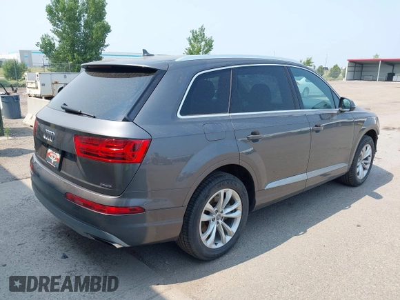 2019 Audi Q7 Premium with VIN WA1AAAF73KD031616, listed as a IAAI auction lot 39952592 with 60,839 mi miles and . Bid and sale history available at DreamBid. Image 4.