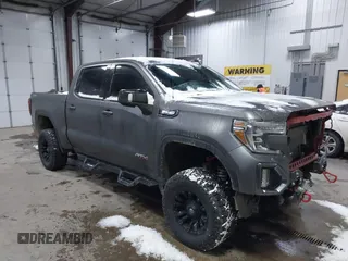 2021 GMC Sierra 1500 AT4 with VIN 3GTP9EEL1MG284910, listed as a IAAI auction lot 41023969 with 53,209 mi miles. Bid and sale history available at carsss.com. Image 1.