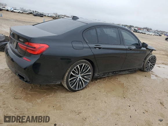 2019 BMW 7 Series 750i с VIN WBA7F0C57KGM24867, выставлен на аукционе Copart как лот 44438835 с пробегом 93 311 миль миль и Списание • Salvage title. История ставок и продаж доступна на DreamBid. Изображение 3.