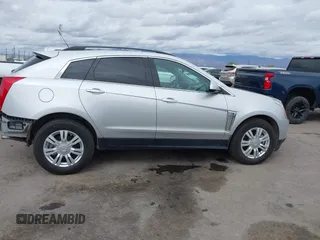 2015 Cadillac SRX with VIN 3GYFNAE34FS629258, listed as a IAAI auction lot 41788601 with 56,939 mi miles and . Bid and sale history available at DreamBid. Image 14.