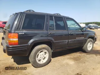 1998 Jeep Grand Cherokee Limited with VIN 1J4GZ78Y5WC170797, listed as a Copart auction lot 75227664 with 177,781 mi miles and Salvage Title. Bid and sale history available at carsss.com. Image 3.