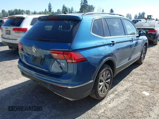 2018 Volkswagen Tiguan SEL z VIN 3VV2B7AX0JM084232, wystawiony jako IAAI lot #42726306 z przebiegiem 97 624 mil mil oraz . Historia ofert i sprzedaży dostępna na DreamBid. Obrazek 4.