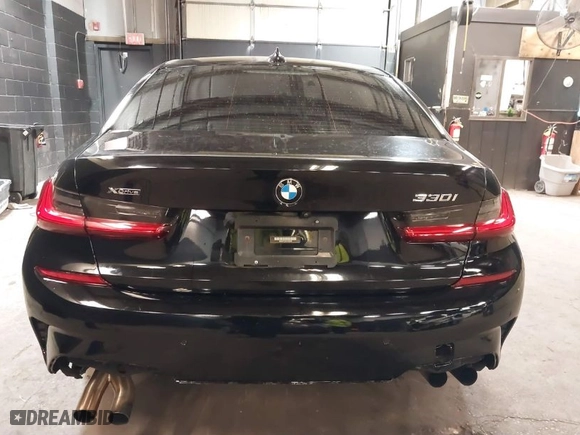 2020 BMW 3 Series 330i xDrive with VIN WBA5R7C05LFH42556, listed as a IAAI auction lot 40687893 with 74,290 mi miles. Bid and sale history available at carsss.com. Image 16.