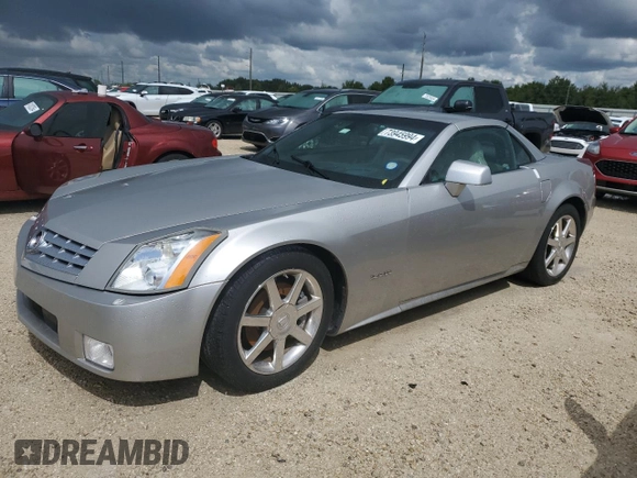 2006 Cadillac XLR z VIN 1G6YV36A365601441, wystawiony jako Copart lot #73945994 z przebiegiem Nie podano mil oraz Szkody całkowita. Historia ofert i sprzedaży dostępna na DreamBid. Obrazek 1.