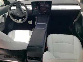 2022 Tesla Model Y Performance z VIN 7SAYGDEF4NF389191, wystawiony jako Copart lot #61443135 z przebiegiem 70 612 mil mil oraz Szkoda całkowita • Salvage title. Historia ofert i sprzedaży dostępna na DreamBid. Obrazek 8.