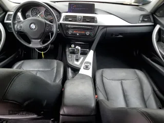 2013 BMW 3 Series 328i with VIN WBA3A5G57DNP23598, listed as a Copart auction lot 55677165 with 217,977 mi miles and Clean Title. Bid and sale history available at carsss.com. Image 8.