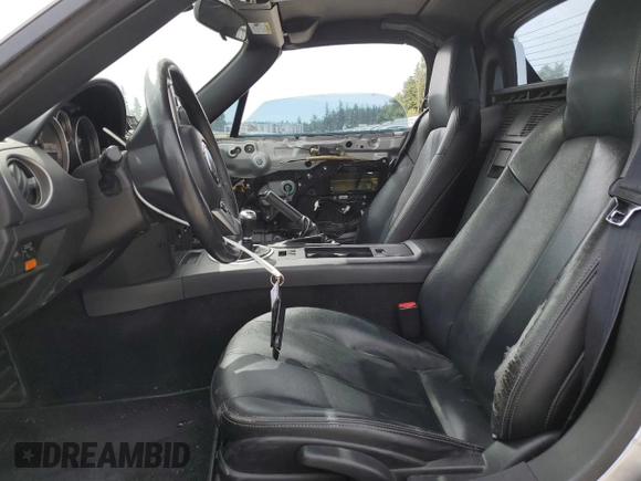 2008 Mazda MX-5 Miata Touring with VIN JM1NC26F780146072, listed as a Copart auction lot 65602695 with 124,607 mi miles and Salvage title. Bid and sale history available at DreamBid. Image 7.