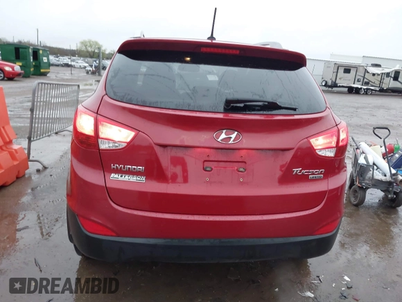 2013 Hyundai Tucson GLS with VIN KM8JU3AC8DU683546, listed as a IAAI auction lot 41956167 with 141,510 mi miles. Bid and sale history available at carsss.com. Image 16.